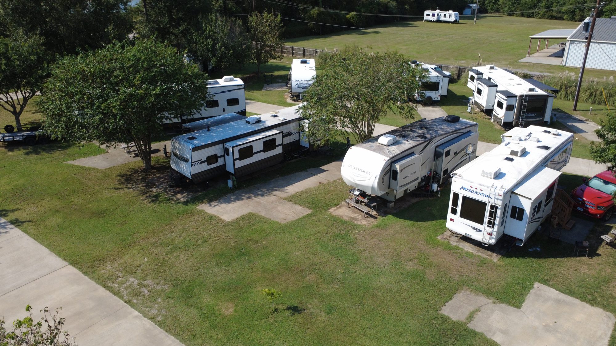 Fifth-wheels parked on concrete pads