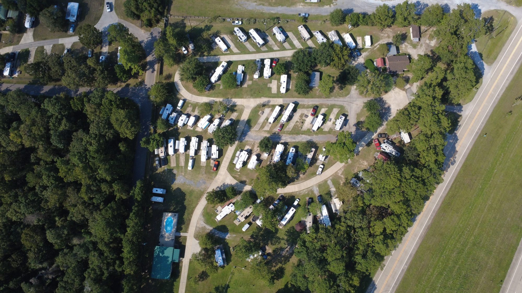 Aerial view of Red Cloud RV Park under the pines along US 96 in Silsbee, Texas